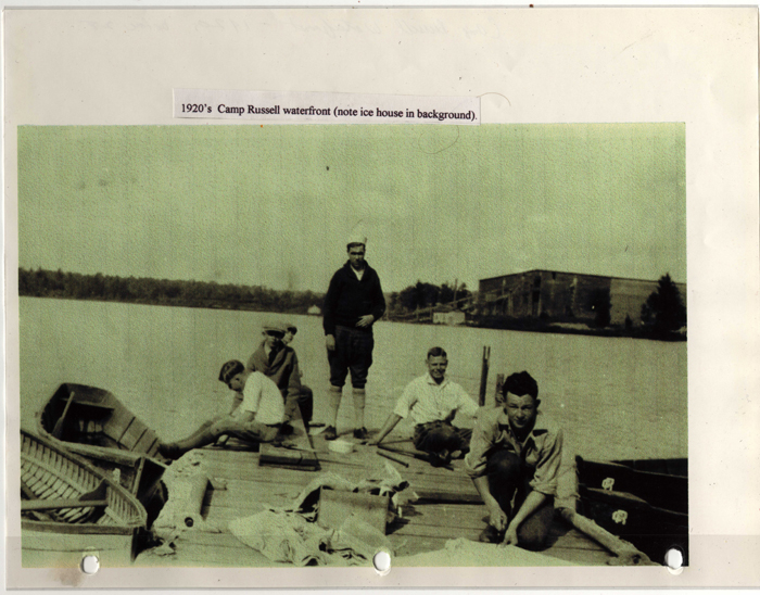 camp russell waterfront with ice house 1920s